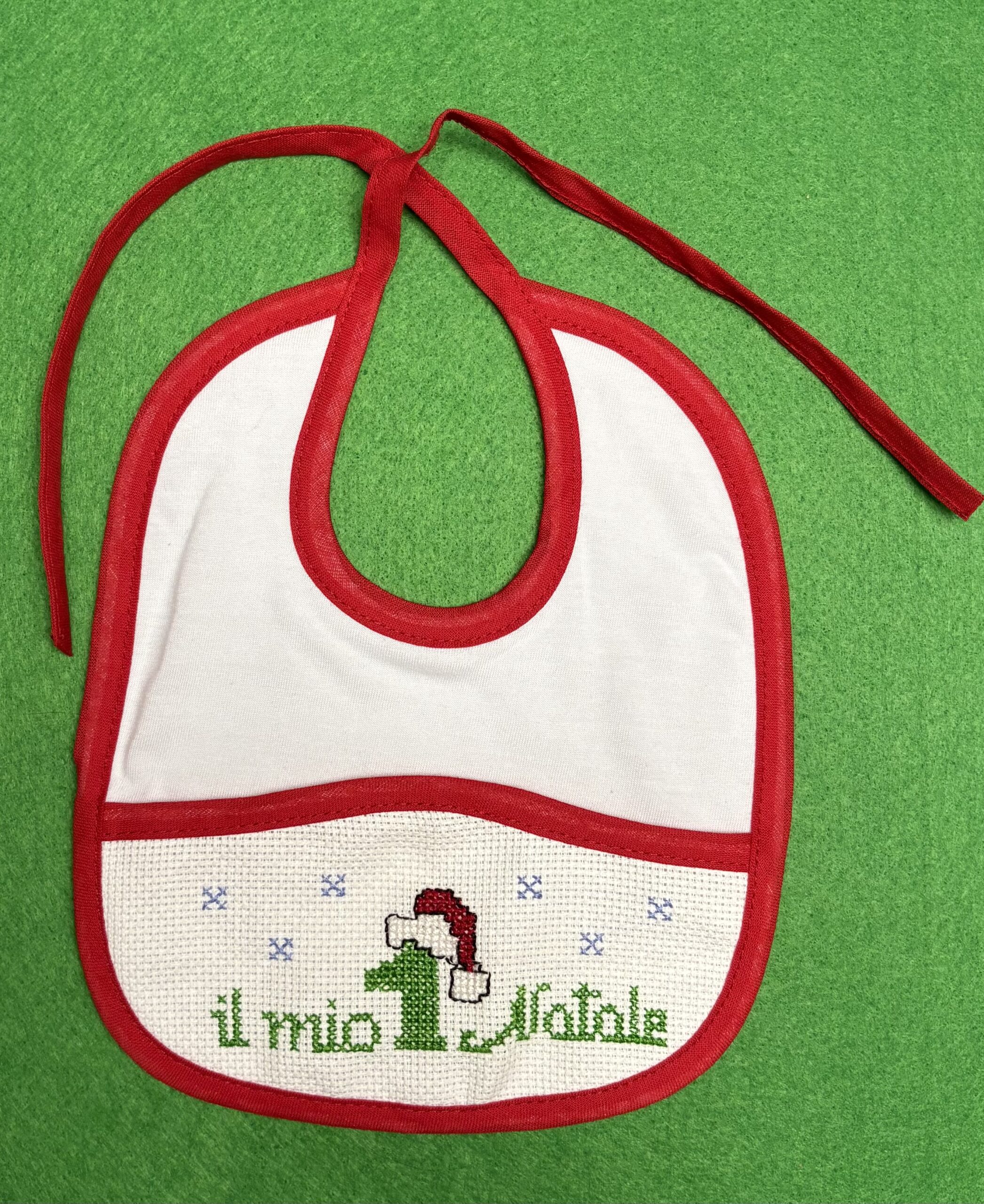 Bavaglini con scritta “Il mio primo Natale”
